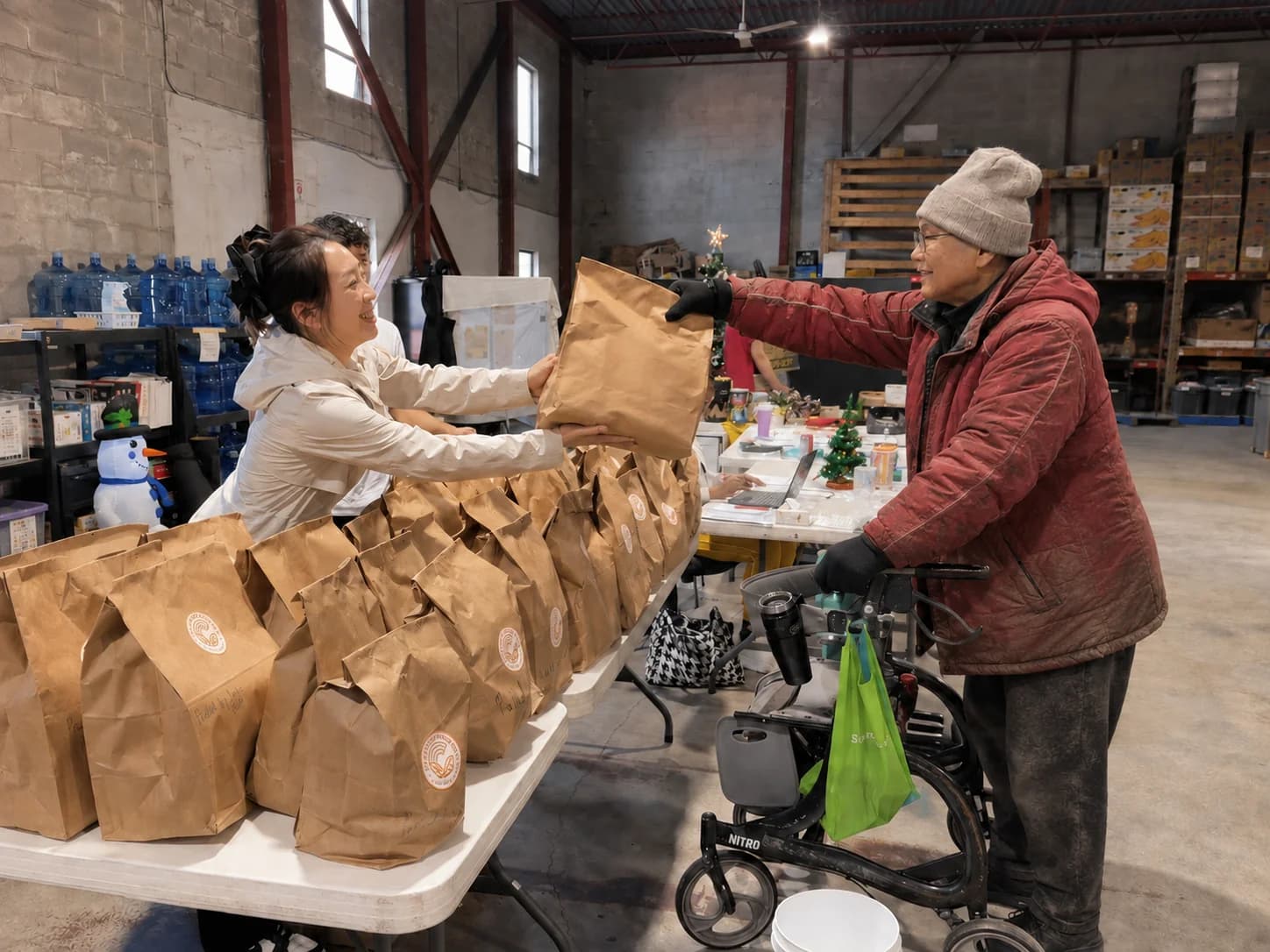 A volunteer handing a community care bag to a neighbour